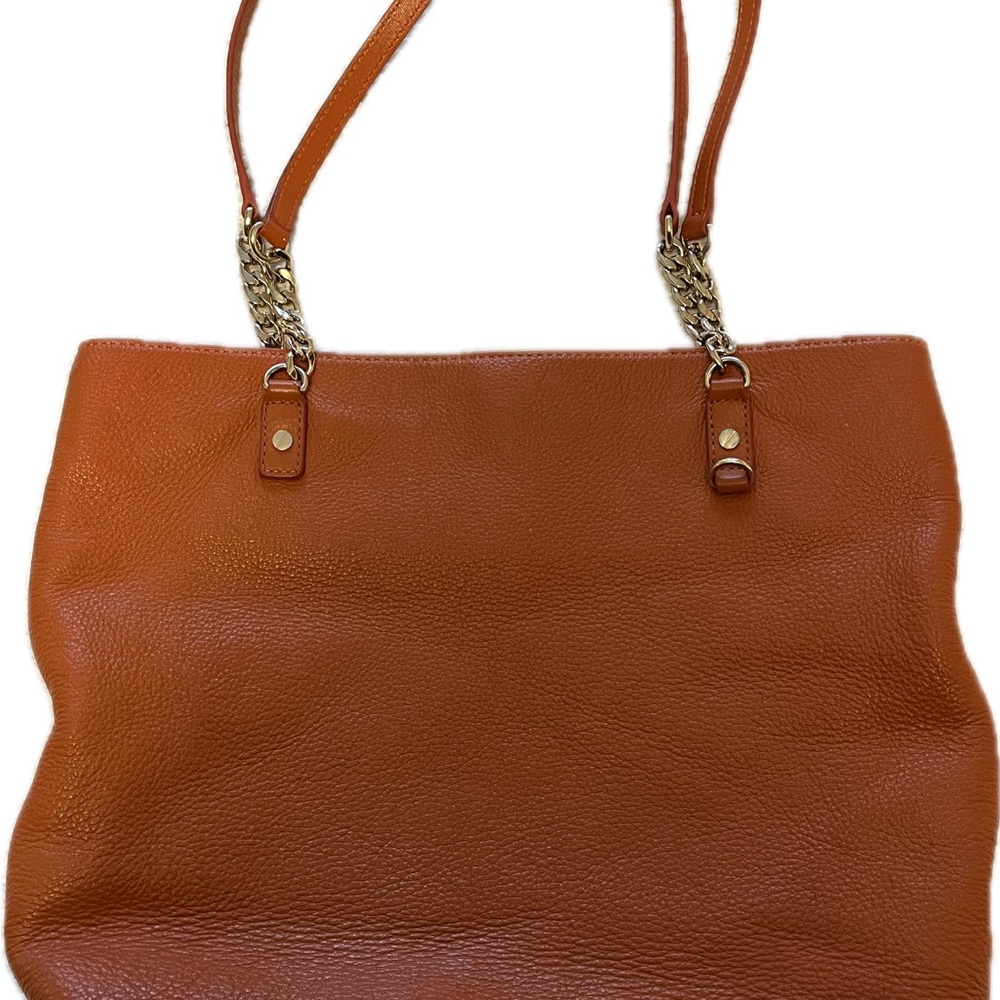 Michael Kors, leather purse pumpkin orange.